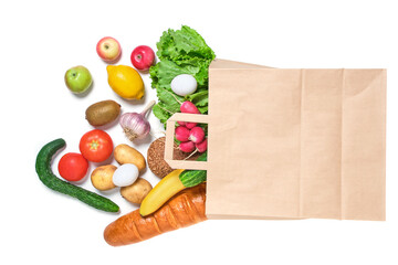 Fruits, vegetables and products in a paper grocery bag on a white background.