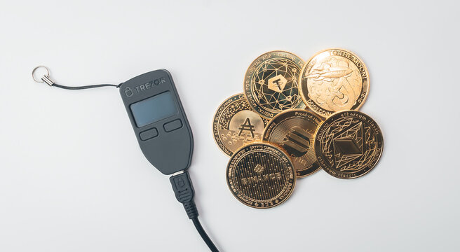 Bangkok, Thailand - 7 August 2022 : Trezor one is a cryptocurrency hardware wallet that safely store your crypto.