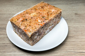 chicken jelly with carrots and spices on a plate