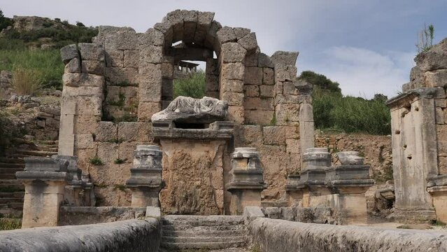 Scenic ruins of the nymphaeum (nymphaion) in Perge (Perga) at Antalya Province, Turkey. High quality FullHD footage
