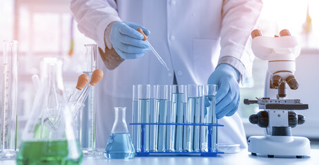 Fototapeta premium Scientist or researchers working in science laboratory, medical technology research work, science laboratory research and development concept.