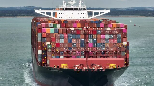 Fully Loaded Container Ship at Sea Transporting Cargo Around the World