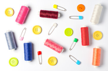 Accessories for sewing on a white background. Closeup.