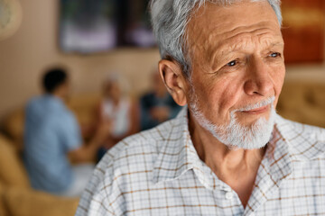 Portrait of thoughtful senior man at nursing home.