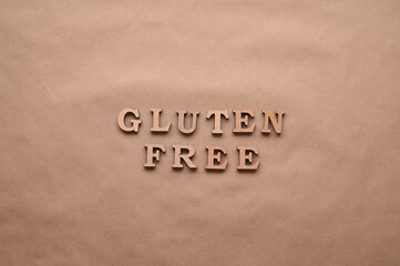 Fototapeta na wymiar Letters Gluten free on a paper background.