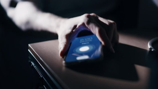 Person Wakes Up and Turns off Alarm Clock on Smartphone. Productive Person Ready Start a Day with Business Opportunities. Close-up Focus on Mobile Phone Clock Showing Six A.M. bedroom Apartment