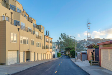 Apartment, townhouses, and homes in a residential area with a view of Sutro Tower