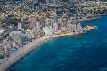 Obraz premium view of the coast, beaches and sea of ​​the city of Calpe with its apartment buildings and hotels