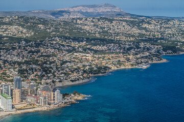 view of the coast, beaches and sea of ​​the city of Calpe with its apartment buildings and hotels