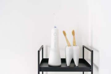 wooden toothbrushes and oral irrigator for dental care