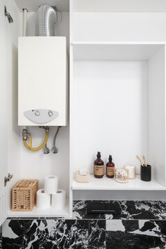 boiler, cosmetics and hygiene products for personal care in cabinet