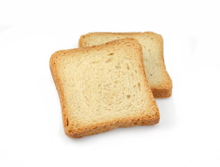 Integral whole wheat toast bread slices isolated on white background. Pieces of toast bread isolated on white. Close-up