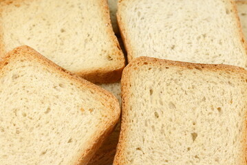 Integral whole wheat toast bread slices isolated on white background. Pieces of toast bread...