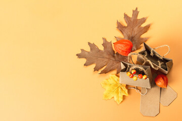 Naklejka na ściany i meble Black Friday Sale concept. Shopping paper bags, handmade tags, fall oak leaves, autumn decor