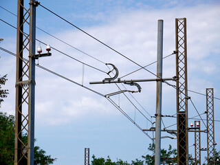 The overhead power line of a mountain train