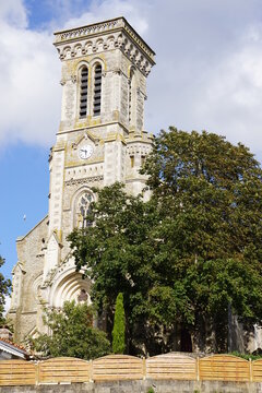 square bell tower of a church in the country in brittany france