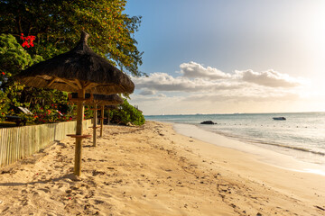 Beach with umbrellas of a hotel at Mauritius Trou aux biches