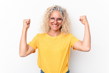 Middle age caucasian woman isolated on white background celebrating a victory, passion and enthusiasm, happy expression.