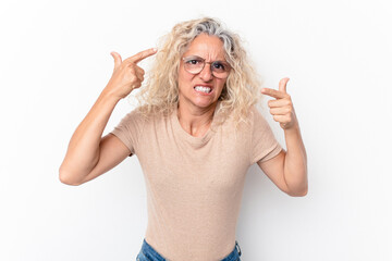 Middle age caucasian woman isolated on white background showing a disappointment gesture with forefinger.