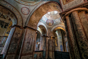 Interior of the St. Sophia Cathedral with mosaic, painting frescoes on the wall and the golden altar. Kyiv, Ukraine