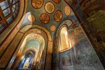 Interior of the St. Sophia Cathedral with mosaic, painting frescoes on the wall and the golden...