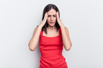Fototapeta premium Young caucasian woman isolated on white background having a head ache, touching front of the face.