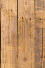 Naklejka premium The texture of wood. Natural pattern on a wooden background. A bench in the park close-up.