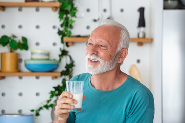 Stay hydrated, maintain salt and water balance, prevent dehydration. Happy healthy senior man holding glass of fresh water. Concept of elderly people developing good habit of drinking enough liquid