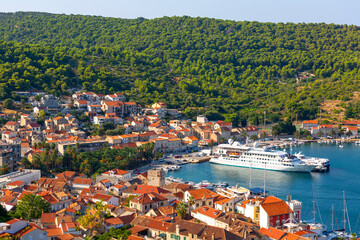 View of the city and port with passenger ferry which connects Split and Vis, Croatia