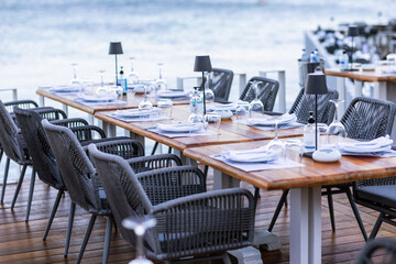 tables in the restaurant at the sea