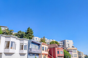 Two row of houses on a sloped neighborhood at San Francisco, California