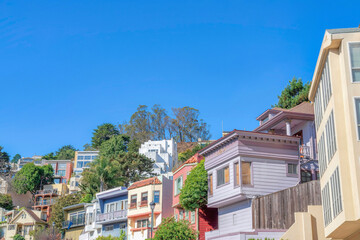 Fototapeta na wymiar Mountainside row of houses in a low angle view at San Francisco, California