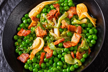 petits pois, french dish of garden green peas