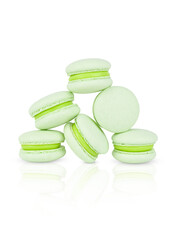 French green macarons isolated on white. pyramid of almond cakes