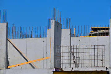 A fragment of the wall of a house under construction on a summer day