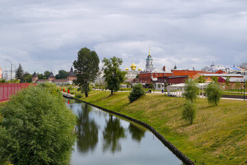 View of the landscaped embankment near the Tula Kremlin. In the background are the domes and the bell tower of the Assumption Cathedral - 522029381