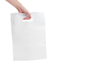 White plastic bag in hand