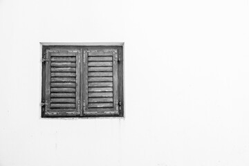 black and white window on white wall