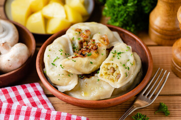 Potato mushroom stuffed vareniky, pierogi or dumplings. Ukrainian cuisine food