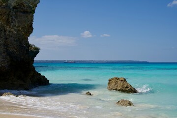 Sunayama Beach in Miyako Island and a tanker crossing the sea