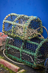 Empty lobster traps on Stranraer marina Loch Ryan Scotland