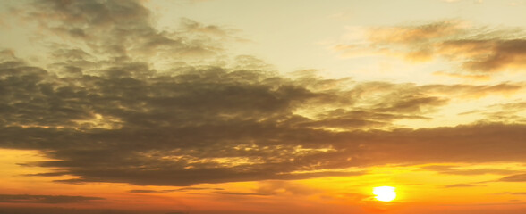 photo twilight sky background. Colorful Sunset sky and cloud. Vivid sky in twilight time background. Fiery orange sunset sky. Beautiful