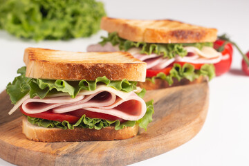 Close-up photo of an American club sandwich. Fast food concept. 