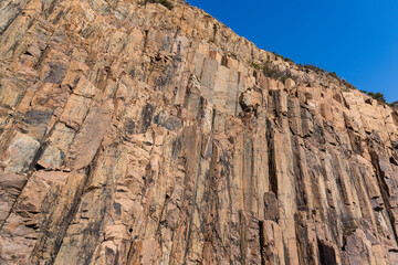 Fototapeta premium Hexagonal rock formation in geopark near east dam in sai kung of Hong Kong
