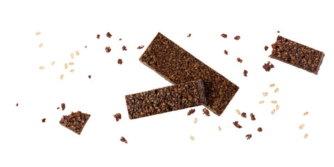 Tasty healthy bars from whole oat grain and chocolate with crumbs flying isolated on white background.