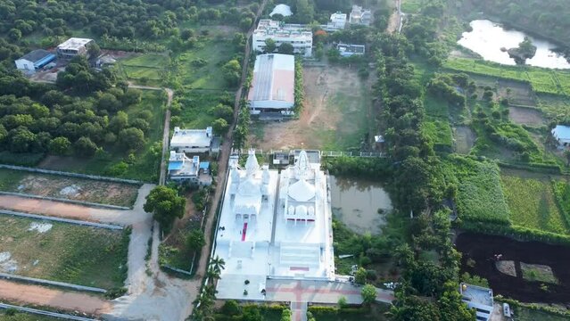Tirupati, Sri Brahmrishi Ashram, India 8th August 2022: A drone shot of a beautiful Indian Hindu temple. Devi Devta. Indian Gods. Laxmi Narayan and Jain temple side by side. 