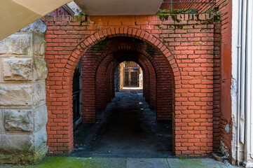 Naklejka premium A view of the alleyway leading to the fist jail in Victoria British Colombia, Canada in summertime