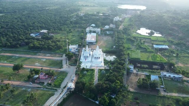 Tirupati, Sri Brahmrishi Ashram, India 8th August 2022: A drone shot of a beautiful Indian Hindu temple. Devi Devta. Indian Gods. Laxmi Narayan and Jain temple side by side. 