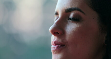 Hispanic girl close-up fac with eyes closed