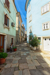 Fototapeta na wymiar street scene with old houses in the town of Cres, Island of Cres, Kvarner, Croatia.